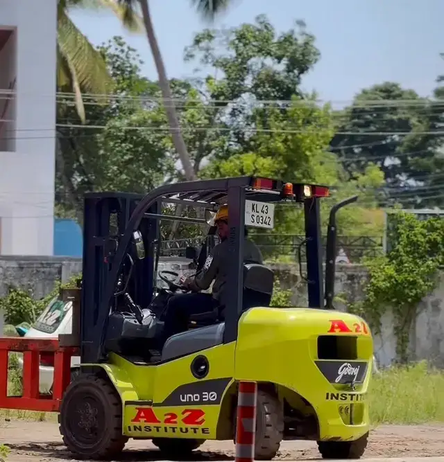 A2Z student operating a Godrej forklift on the training ground