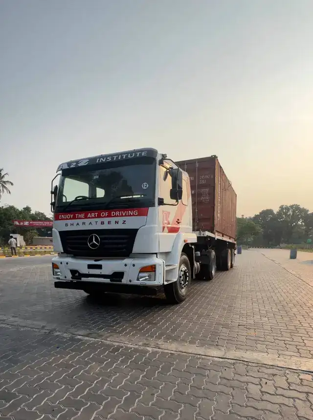 A2Z BharatBenz trailer carrying a shipping container